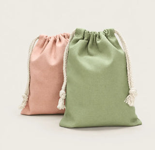 Aufbewahrungsbeutel mit Kordelzug aus Baumwolle in rosa und grün